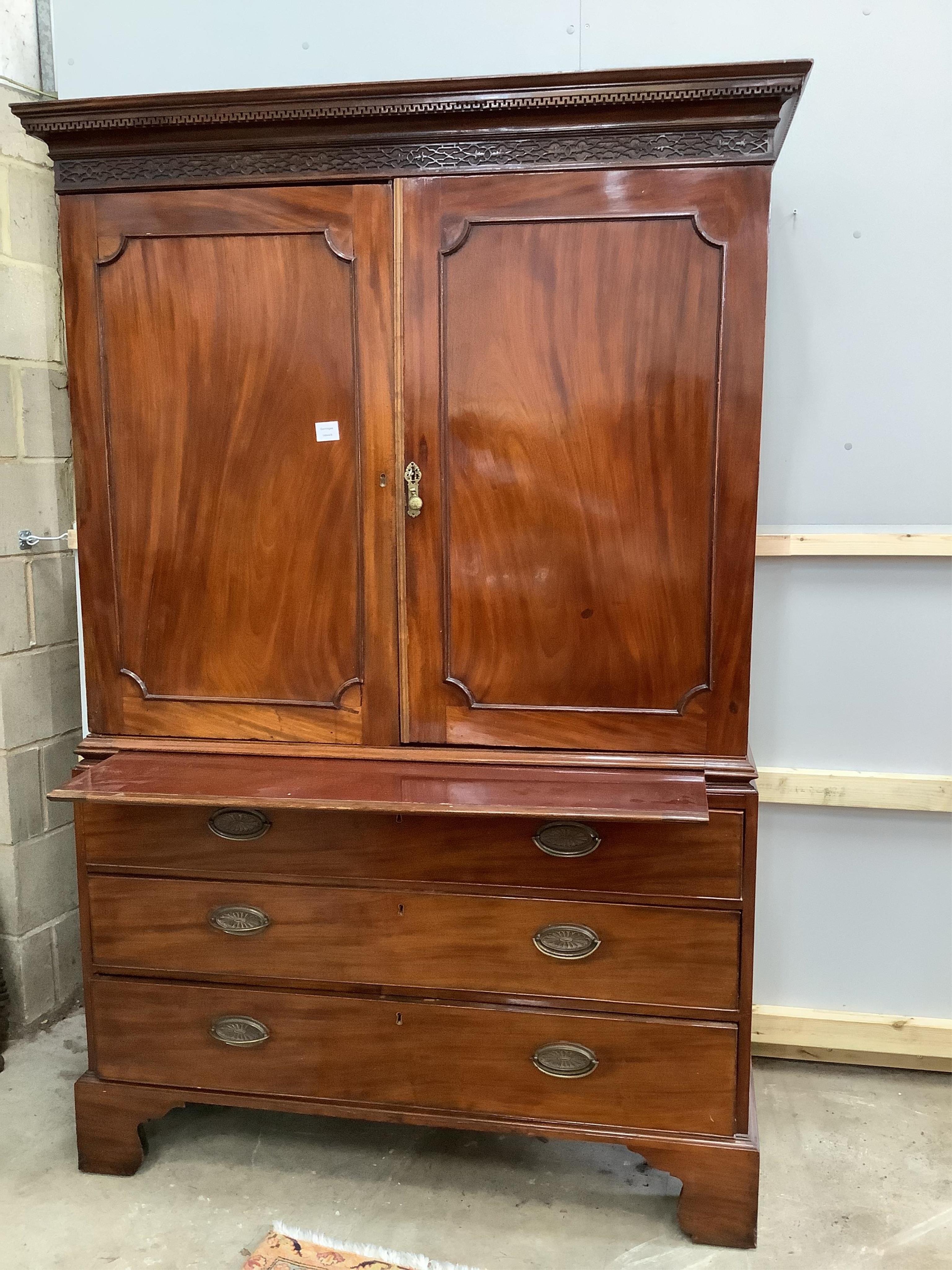 A George III and later mahogany linen press, width 132cm, depth 58cm, height 199cm. Condition - fair
